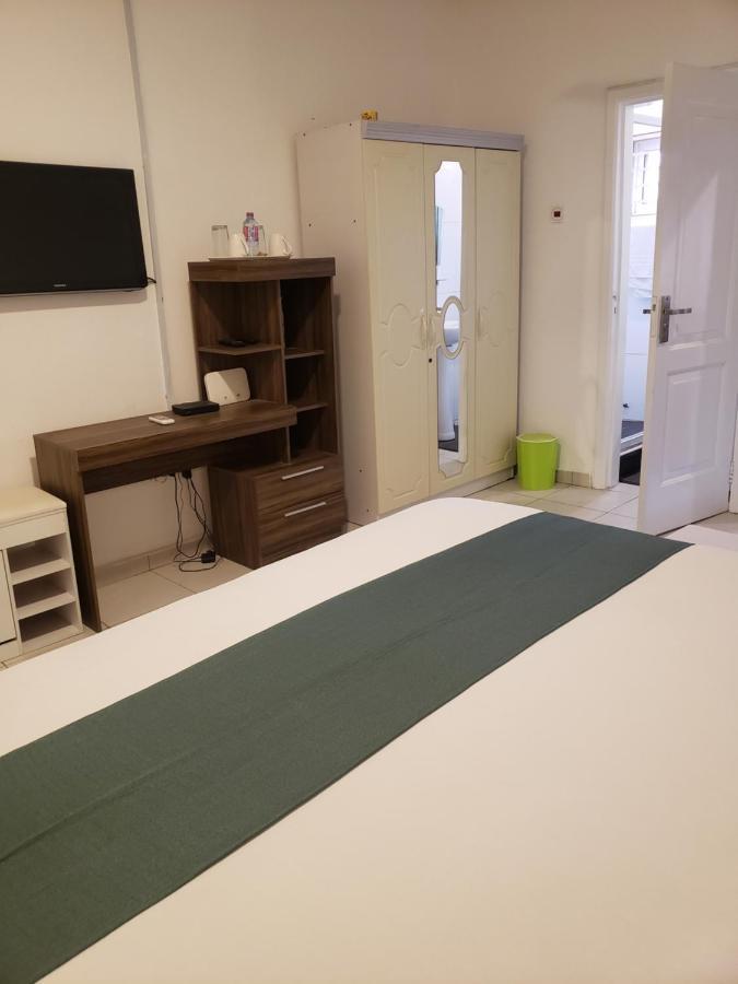 Hgl Guest House 东勒贡 外观 照片